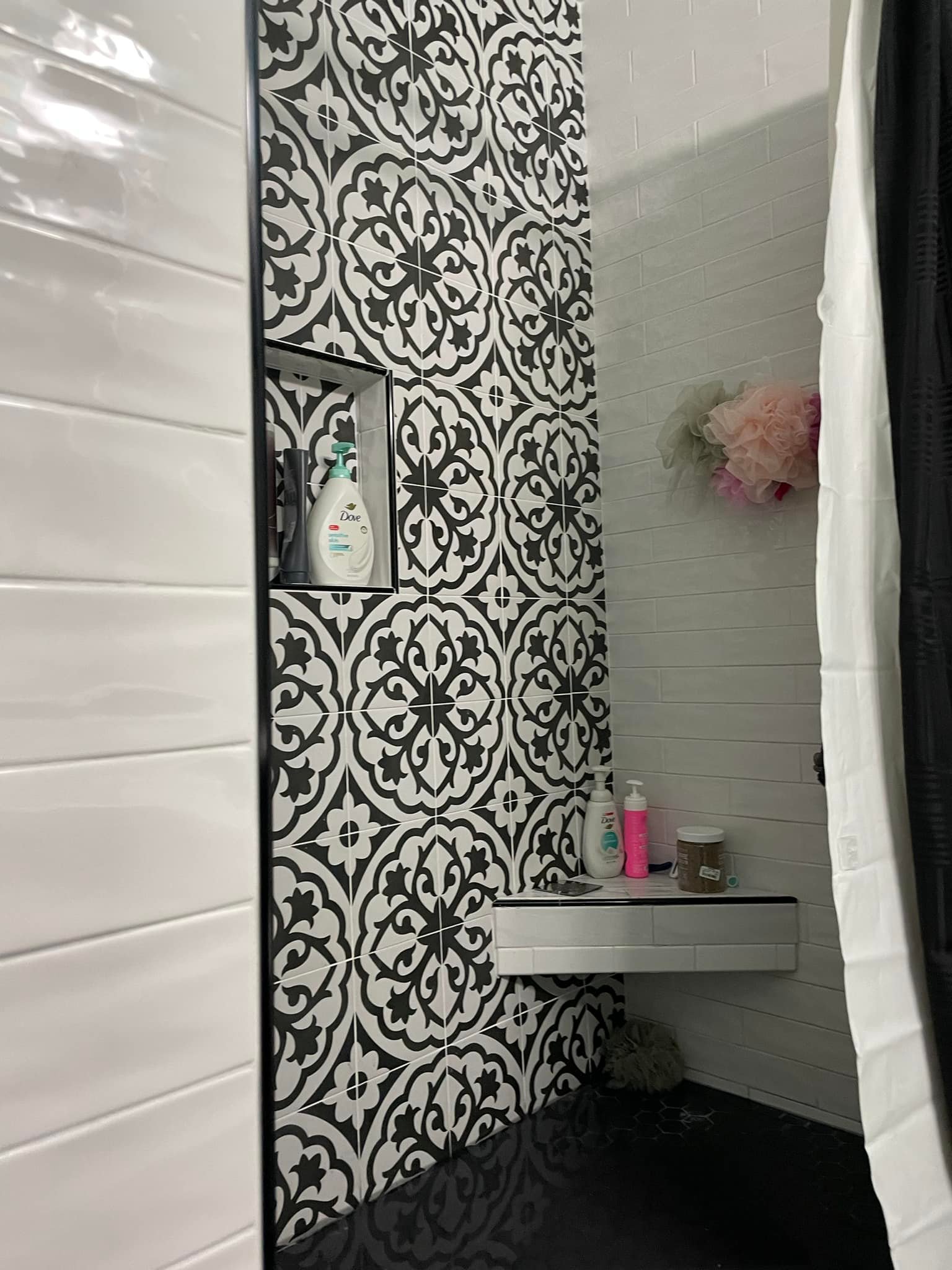 Decorative pattern walk-in shower tile installed in Comanche TX — custom shower by Heart of Texas Flooring